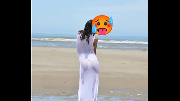 Nude model in a public beach photoshoot. Small tits nice ass