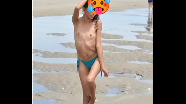 Nude model in a public beach photoshoot. Small tits nice ass