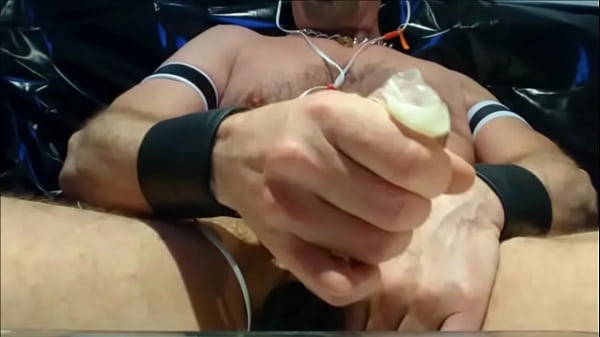 Big cock in condom loading loads of cum