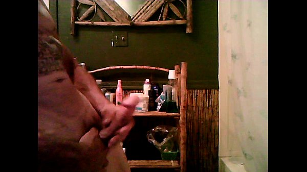 Stroking my cock and loving it