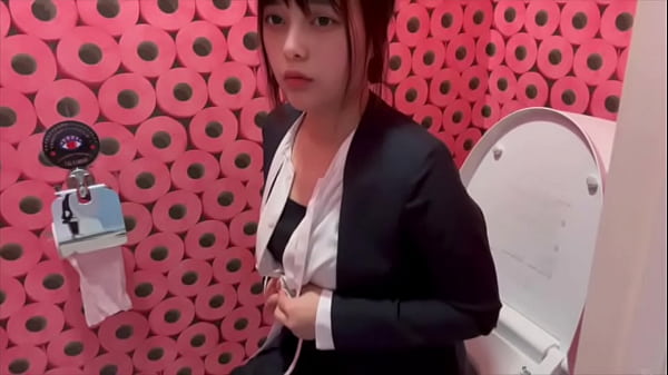 When I went to the bathroom after work in my suit, I took off my sweaty pantyhose and masturbated, which made me excited...