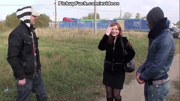 Busty redhead blowjob in a park