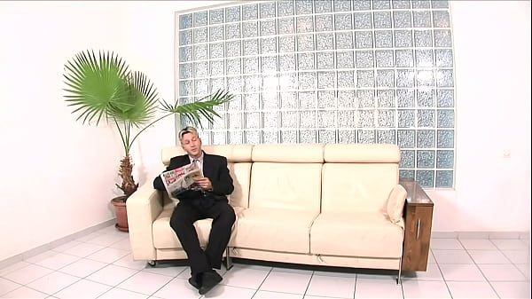 Tess Morgan is a happy Latin teen who sits on her couch looking excited, knowing that...