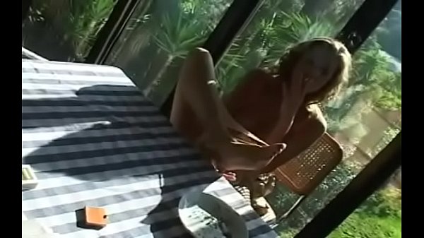 Exposed bombshell with nice tits enjoys a relaxing smoke session