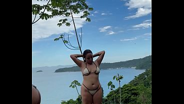 Lesbian couple have sex on a beach in Rio de Janeiro.