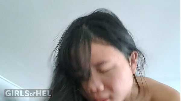 Tiny slim flat-chested Asian teen loves bouncing on big white dick and receiving his glorious cum