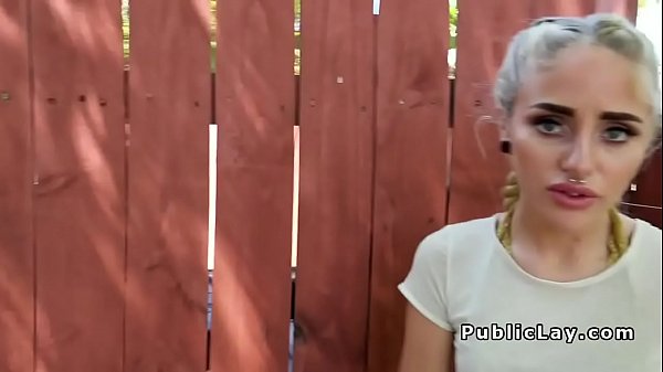 Pierced nose blonde bangs in public