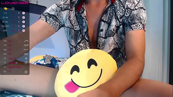 A shy young man masturbates placing a pillow in...