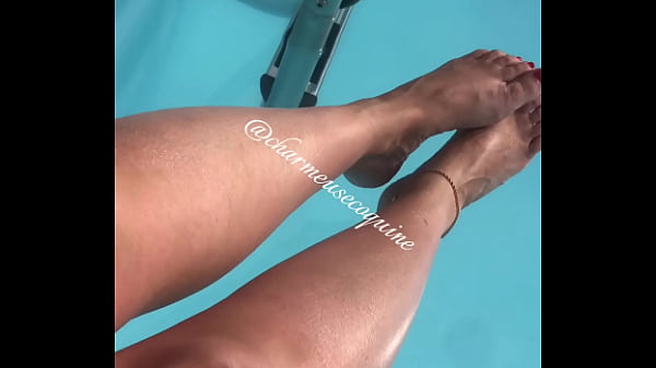 In front of the swimming pool
