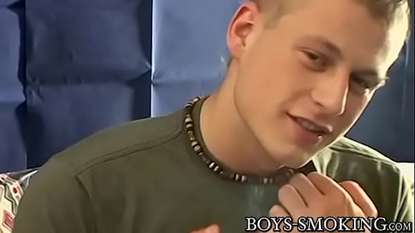 Nubile amateur Keith Ledger smokes cigars while...