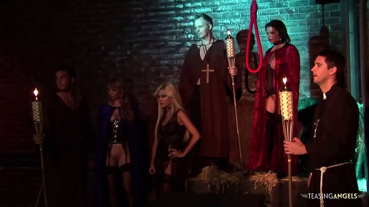 The blonde and brunette milfs with fake boobs have group sex in the creepy basement