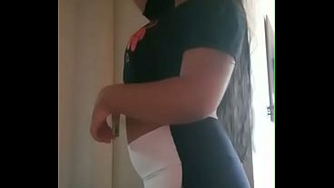 Young girl in leggings at home