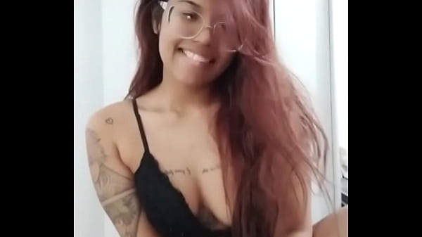 Young girl playing with her breasts