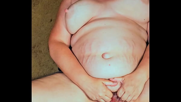 Playing with her clothes while I piss on her pussy