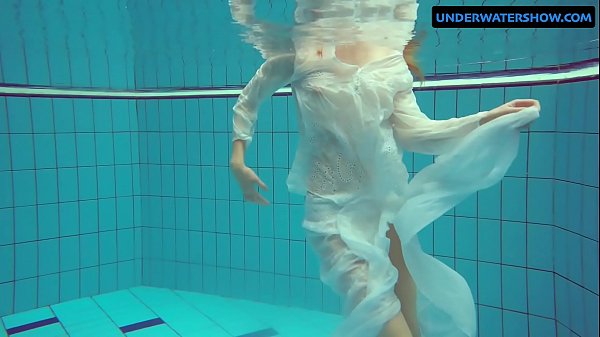 Redhead Diana hot and horny in a white dress