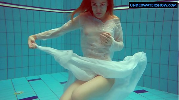 Redhead Diana hot and horny in a white dress