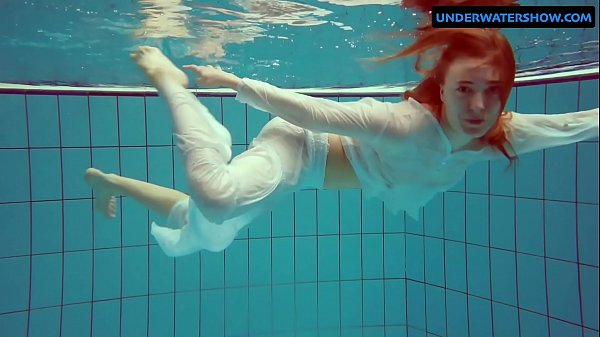 Redhead Diana hot and horny in a white dress