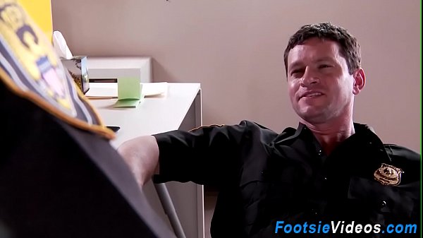Policewoman gives footjob