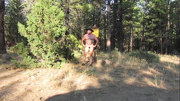 Naked at the campfire sign.