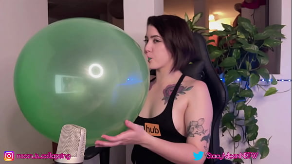 Inflating a big green baloon