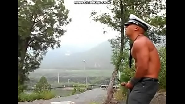 Chinese muscular guy jerking outdoor and load a...
