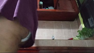 I stroked my mother-in-law's buttocks while she was in the kitchen