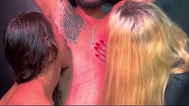 Two beautiful dominatrixes, and the submissive getting a spanking while being obedient.