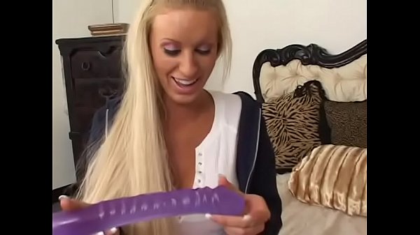 Stunning blonde and brunette in cheerleader uniforms fuck with a long dildo in bed