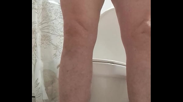 Hot mature milf fingers her pussy with urine