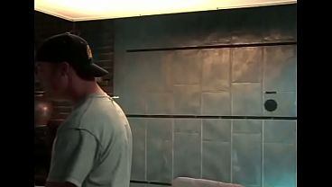 Dark Haired Beauty Takes on Two Big Dicks at Once