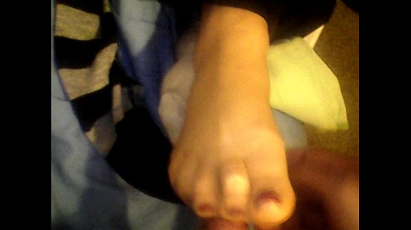 my wife jerks me off with her beautiful feet