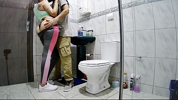 Mistress getting intimate in the bathroom after a workout.