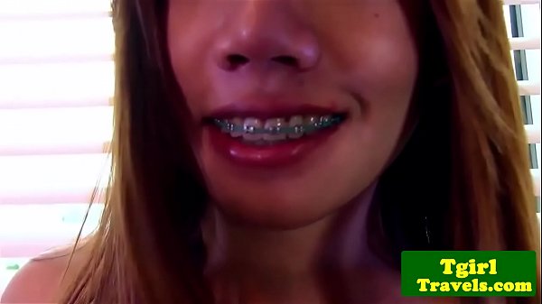 Thai ladyboy with braces strokes and poses what...