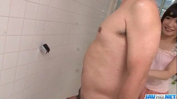 Brunette babe Tsukushi kneels to suck and swallow