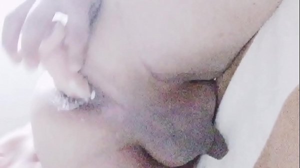 Mexican Tranny pleasuring her asshole with a ni...