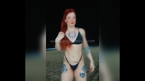Ruivinha masseuse on Copacabana beach, rio de janeiro, Brazil