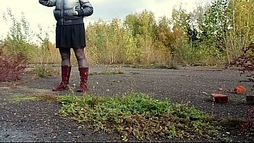 Outdoor pissing. A MILF urinates while walking in a public park and by the sea.