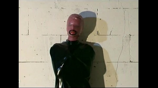 Slutty girl in latex spreads her pussy