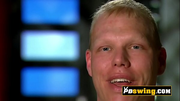 Big breast swinger babe is having oral sex in a room full of strangers.