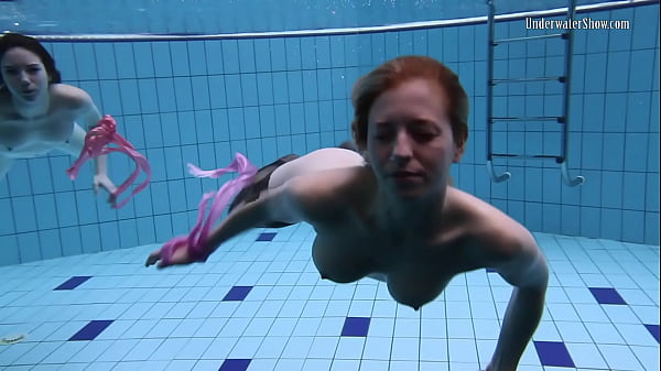 Andrejka and Aneta swim naked in the swimming pool