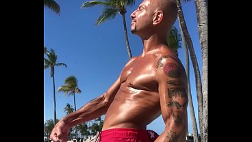 FLEXING AT THE BEACH