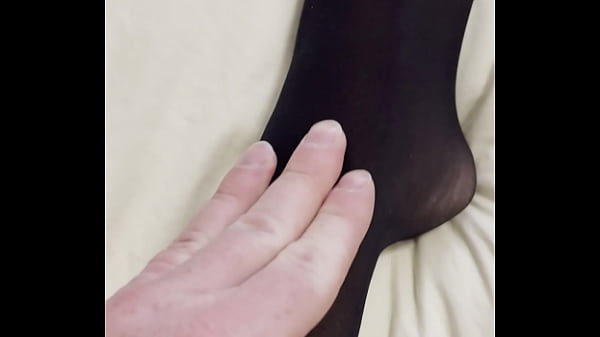 Getting my nylon covered feet rubbed..