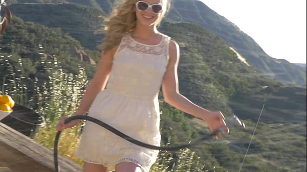 See her take off her pretty white dress just as she summer sun starts to set so she can...