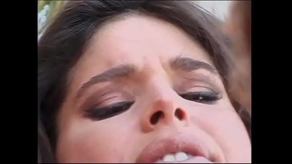 Brunette in hot red dress gets her pussy fucked poolside
