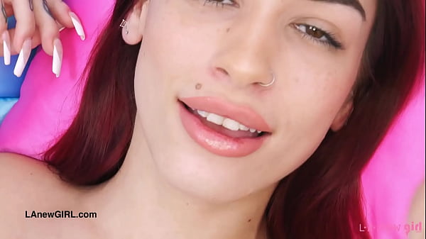 Sexy red-haired model shows her sexy body