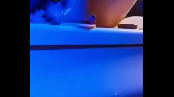 Russian beauty Hanna relaxes in the Jacuzzi and plays with her pussy