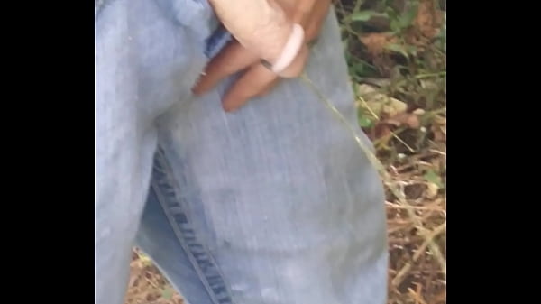 Man pissing outside!