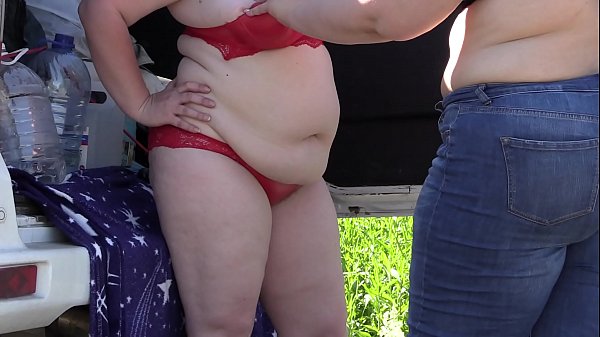 Voyeur spying on two fat lesbians who make a sex film near the car. Mature girlfriends with big asses behind the scenes. Fetish outdoors.