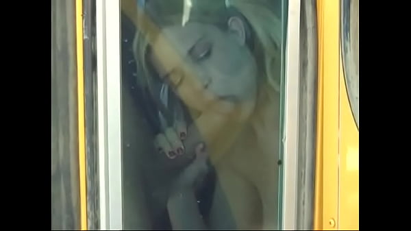 Tiny blonde with tattoo fucks on the bus and gets cum on face