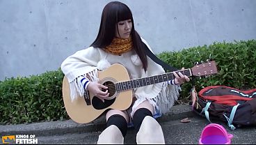 Japanese singer gets her shaved pussy pleased by a guy with various toys